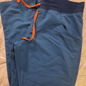 Figs Teal Scrub Top with Orange Logo Print